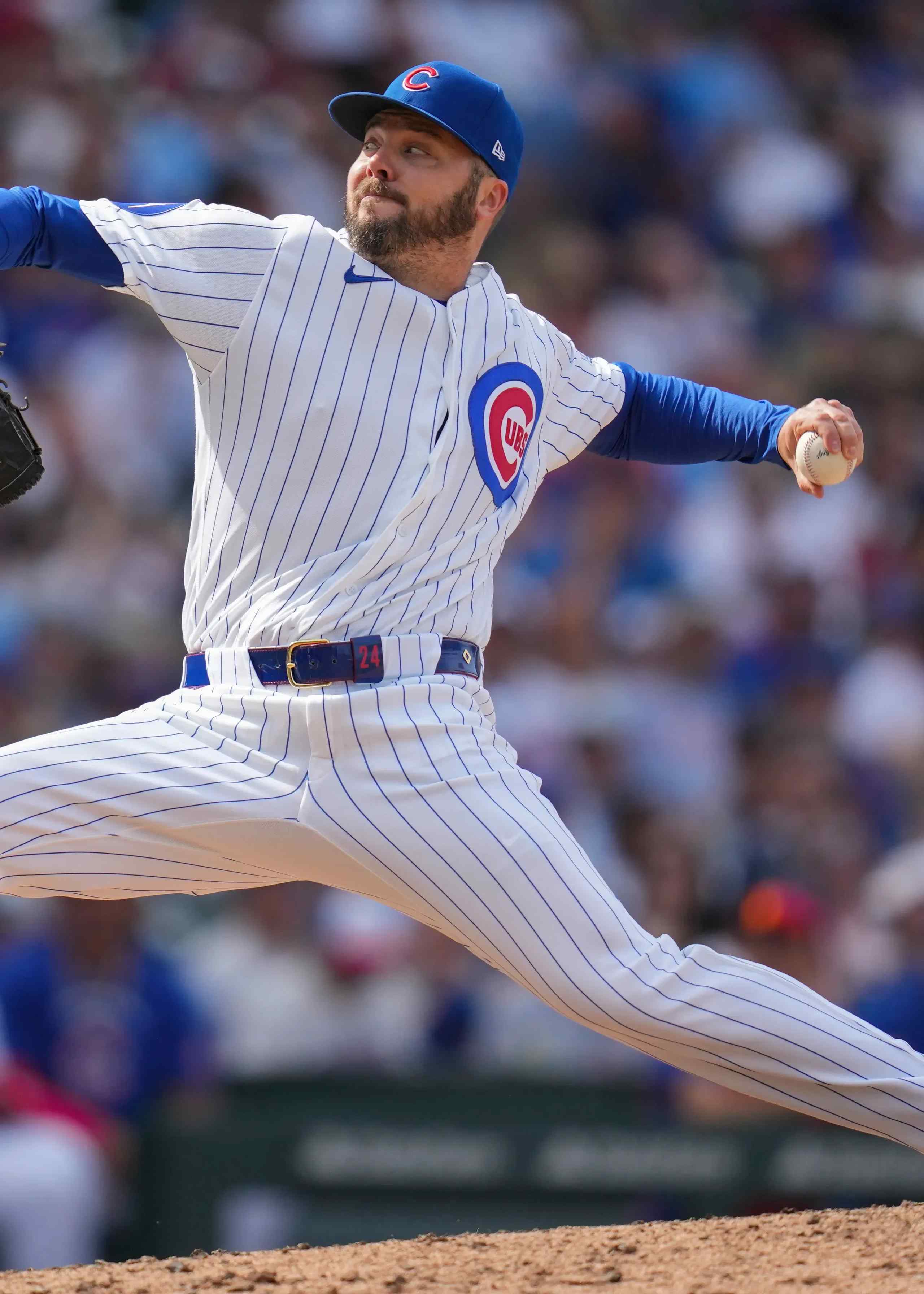 A Chicago Cubs pitcher throws the ball.